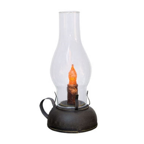 A smoky black tin library lantern with a strap metal handle and a glass chimney, featuring a battery-operated LED candle inside.