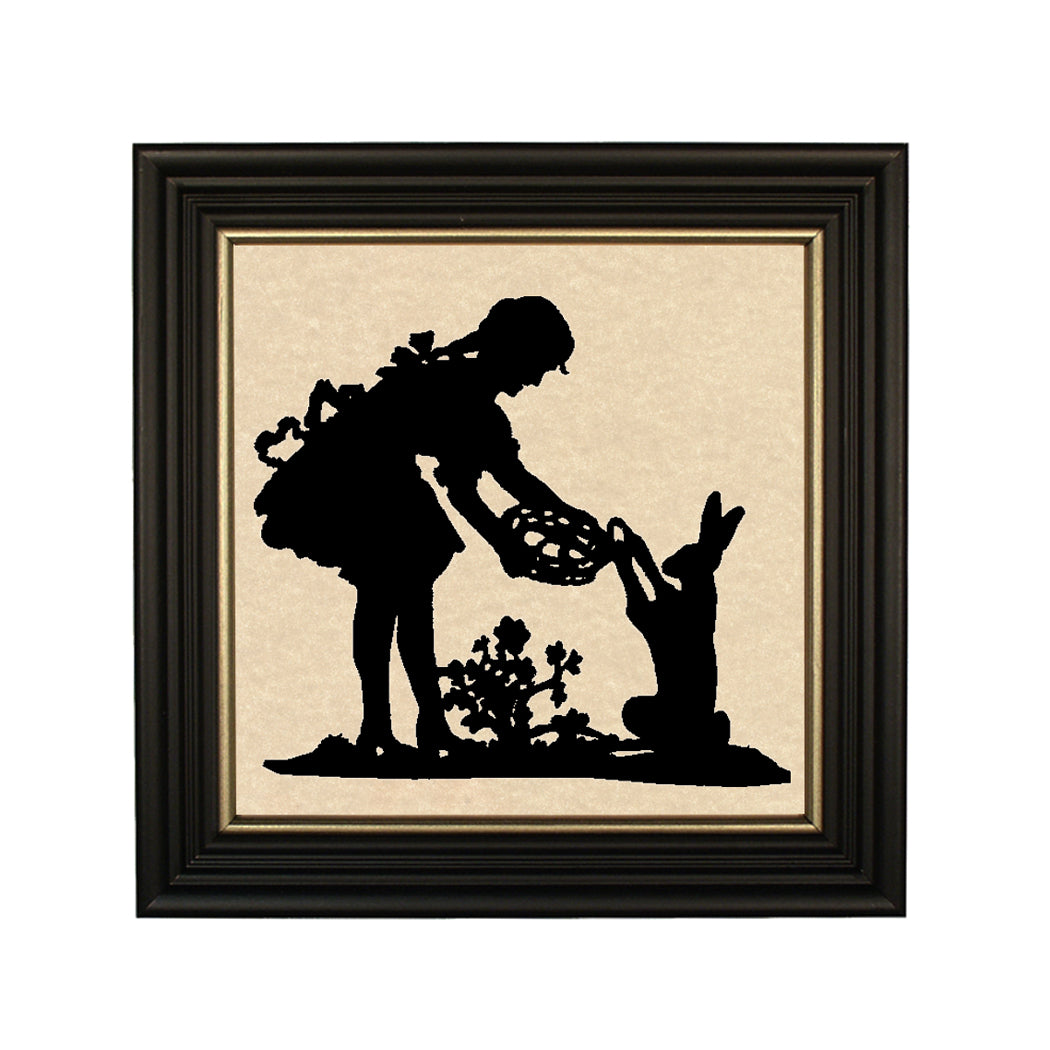 Silhouette of girl with bunny and basket in black frame