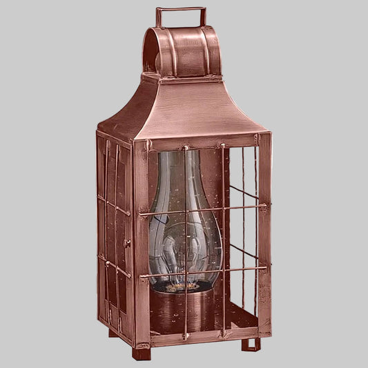 Copper lantern with glass panels on a white background
