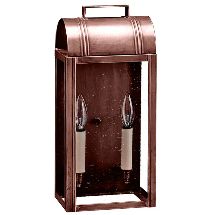 Copper lantern with two candle-like lights on a white background