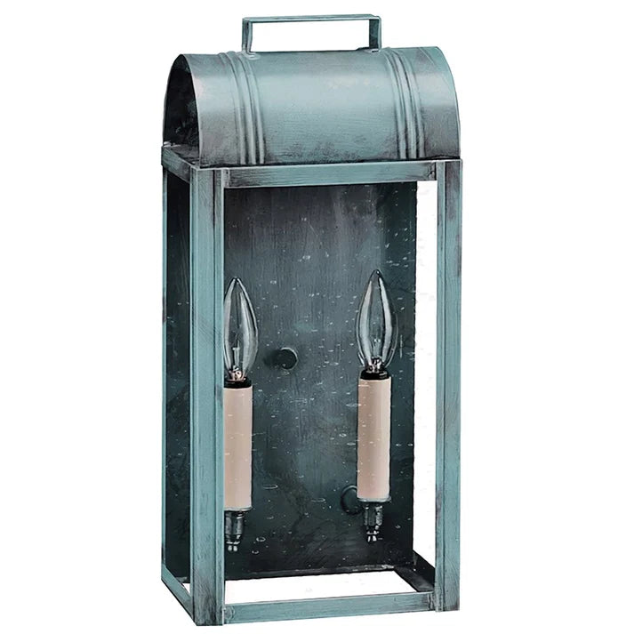 Vintage-style metal lantern with two candle-like lights on a white background