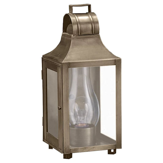 Bronze lantern with a clear glass front on a gray background