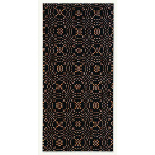 A jacquard towel with a geometric pattern in black and brown colors.