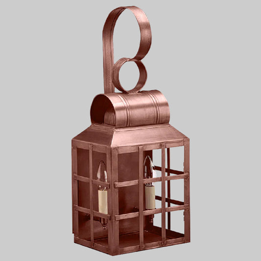 Copper lantern with a decorative top on a white background