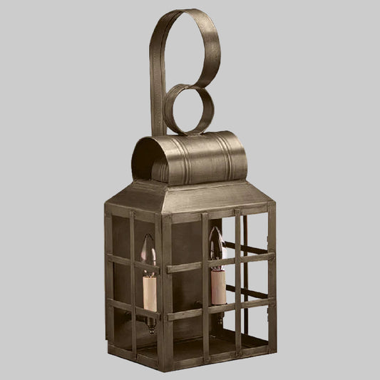 Bronze lantern with circular top design on a white background