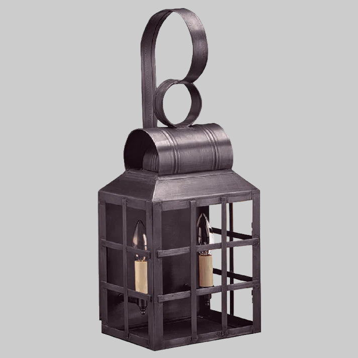 Decorative metal lantern with circular top design on a white background