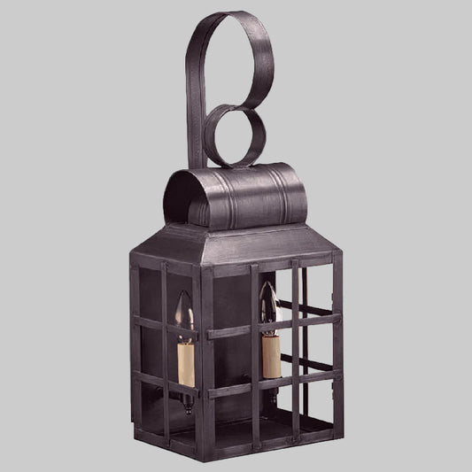 Decorative metal lantern with circular top design on a white background