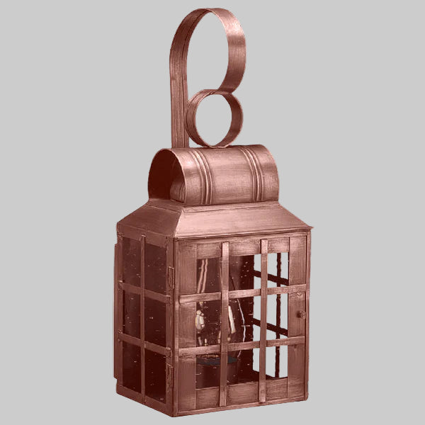 Copper lantern with a handle on a gray background