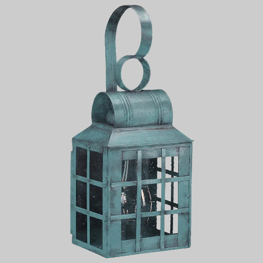 Teal metal lantern with a handle on a gray background