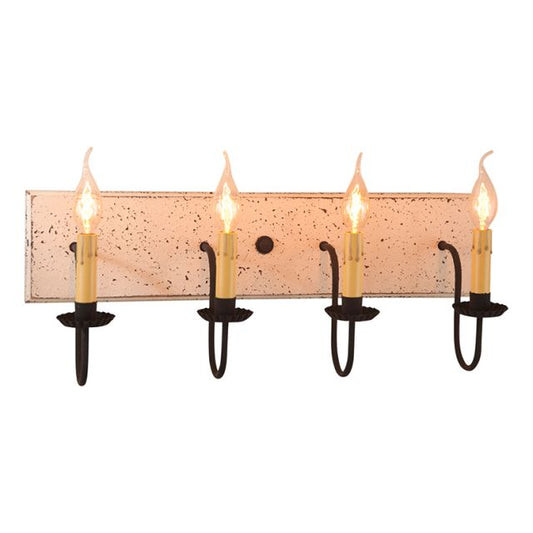 A vintage white four-light vanity light with black textured arms and crimped pans, handcrafted in Pennsylvania.