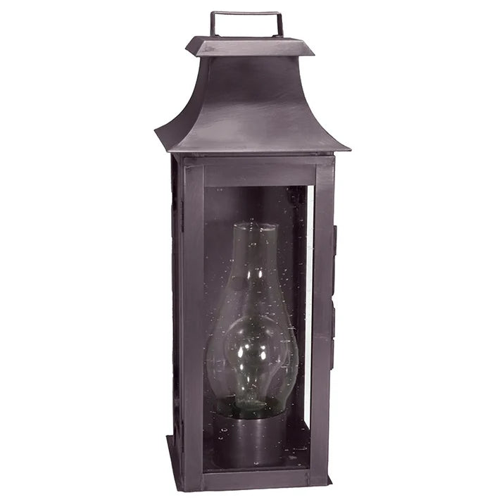 Decorative lantern with a glass insert on a white background