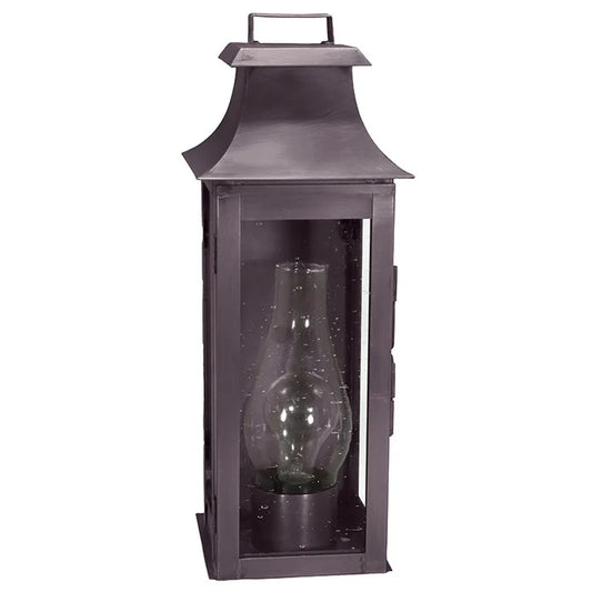 Decorative lantern with a glass insert on a white background