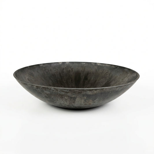 Black plastic bowl on a white background.