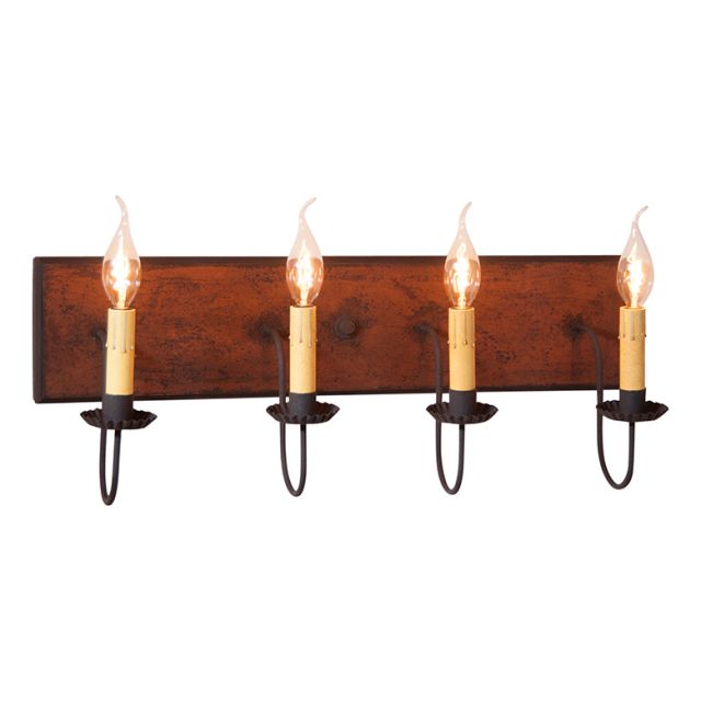 A four-light vanity light fixture with a rustic wooden backplate and black textured arms, featuring E12/Candelabra sockets.
