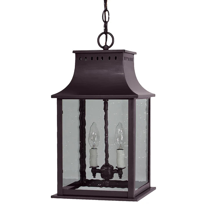 Black lantern with glass panels on a white background