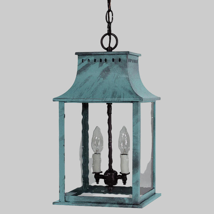 Vintage-style hanging lantern with two light bulbs on a white background