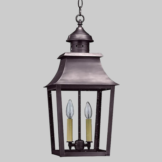 Decorative hanging lantern with two candle-like lights on a white background