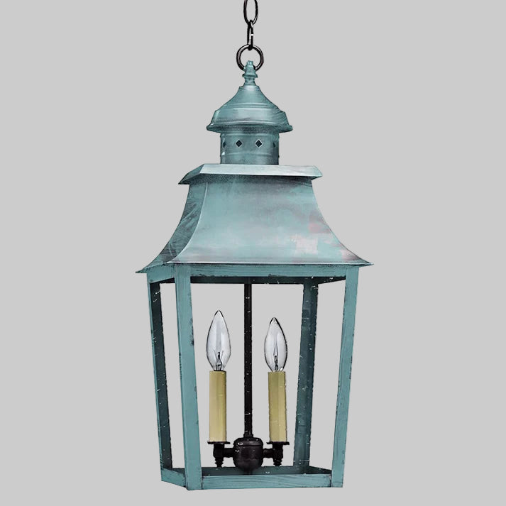 Vintage-style hanging lantern with two candle-like lights on a white background