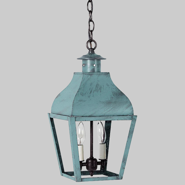 Teal hanging lantern with clear glass on a white background