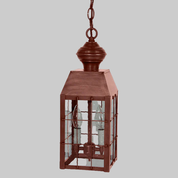 Bronze lantern with glass panels on a white background