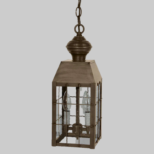 Bronze lantern with glass panels on a white background