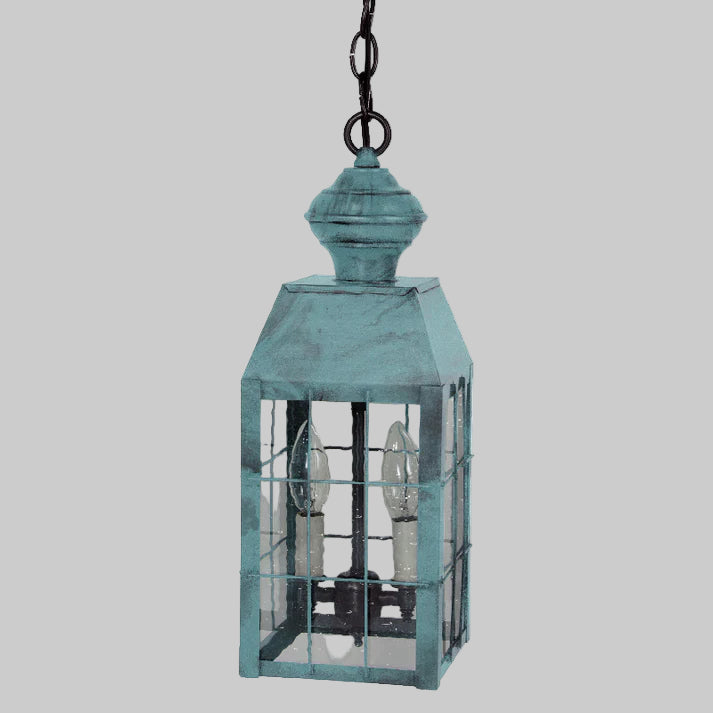 Teal hanging lantern with glass panels on a white background