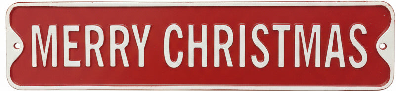 Red and white 'Merry Christmas' sign on a metal surface