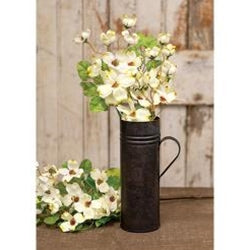 Metal flower holder holding white bouquet