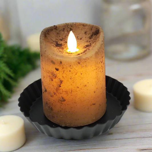 3x4 cream colored pillar candle that runs on batteries with a timer feature.