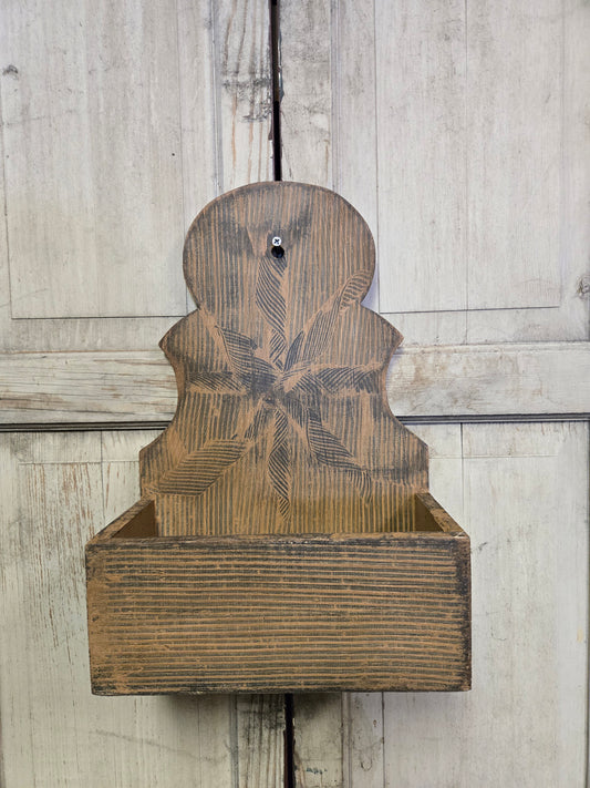 Primitive wall box painted in a mustard color with combing