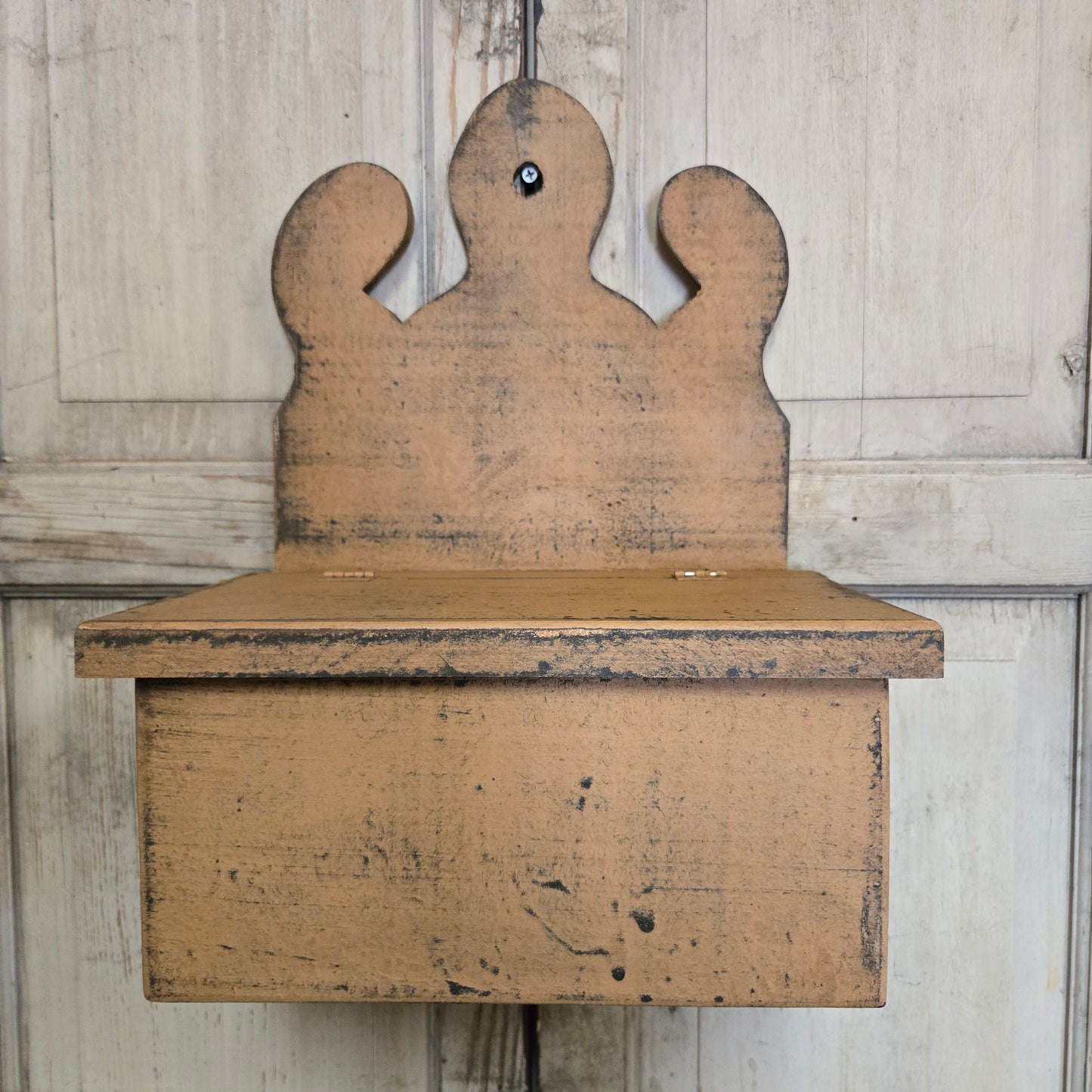 Wooden wall box on a wooden surface