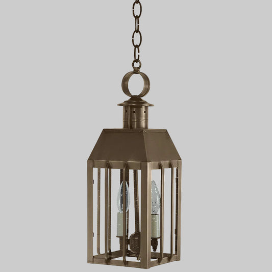 Bronze hanging lantern with glass panels on a white background