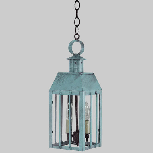 Decorative hanging lantern with a chain on a white background