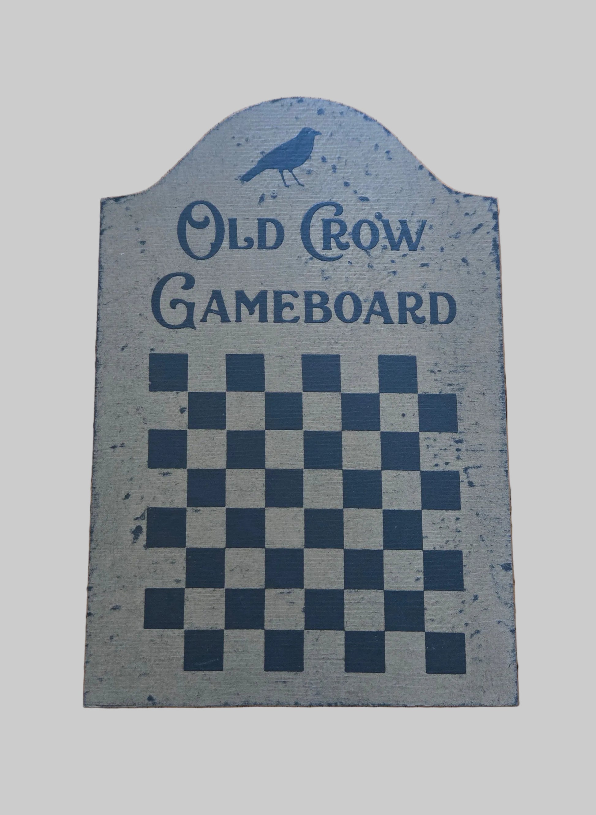 Vintage-style 'Old Crow Gameboard' with checkered pattern on a gray background