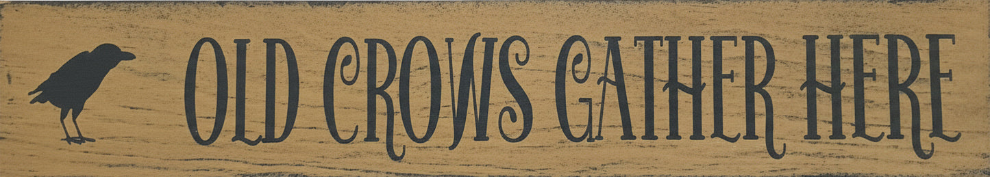 Wooden sign with 'Old Crows Gather Here' text and a silhouette of a crow on a beige background.