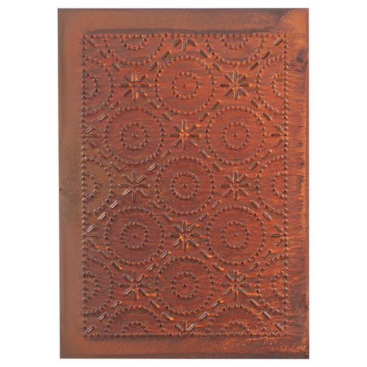A rectangular panel with a rustic tin finish, featuring an intricate, pierced design that creates a country mood.
