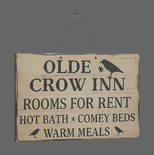 Wooden sign with text 'Olde Crow Inn' on a gray background