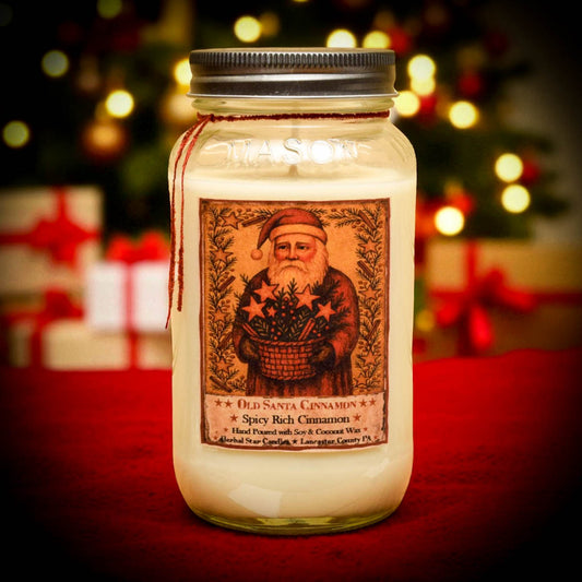 Jar candle with a Santa Claus label on a red background with blurred Christmas lights and presents.