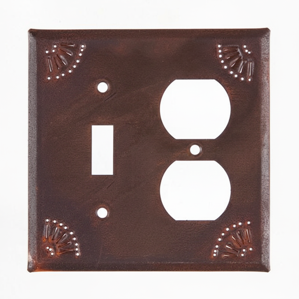 Decorative wall plate with switch and outlet cutouts on a white background
