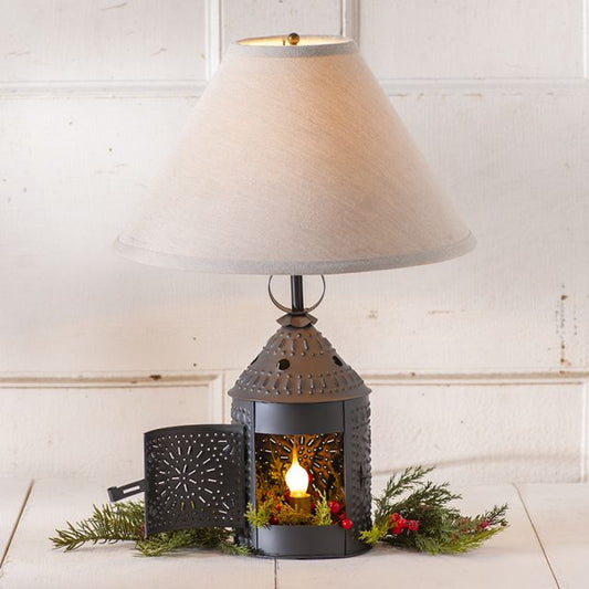 Decorative lamp with a lantern base on a white surface