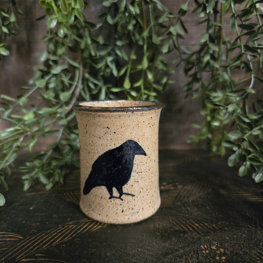 Miniature stoneware crock with the silhouette of a crow