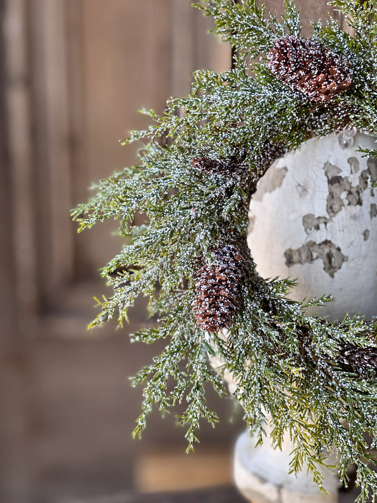 Detail close up of candle ring pinecones.
