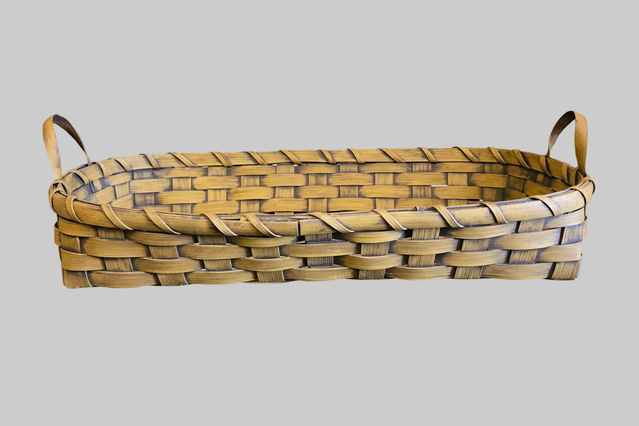 Woven basket tray on grey background