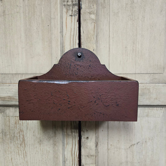 Rustic wood candle box on a wooden background