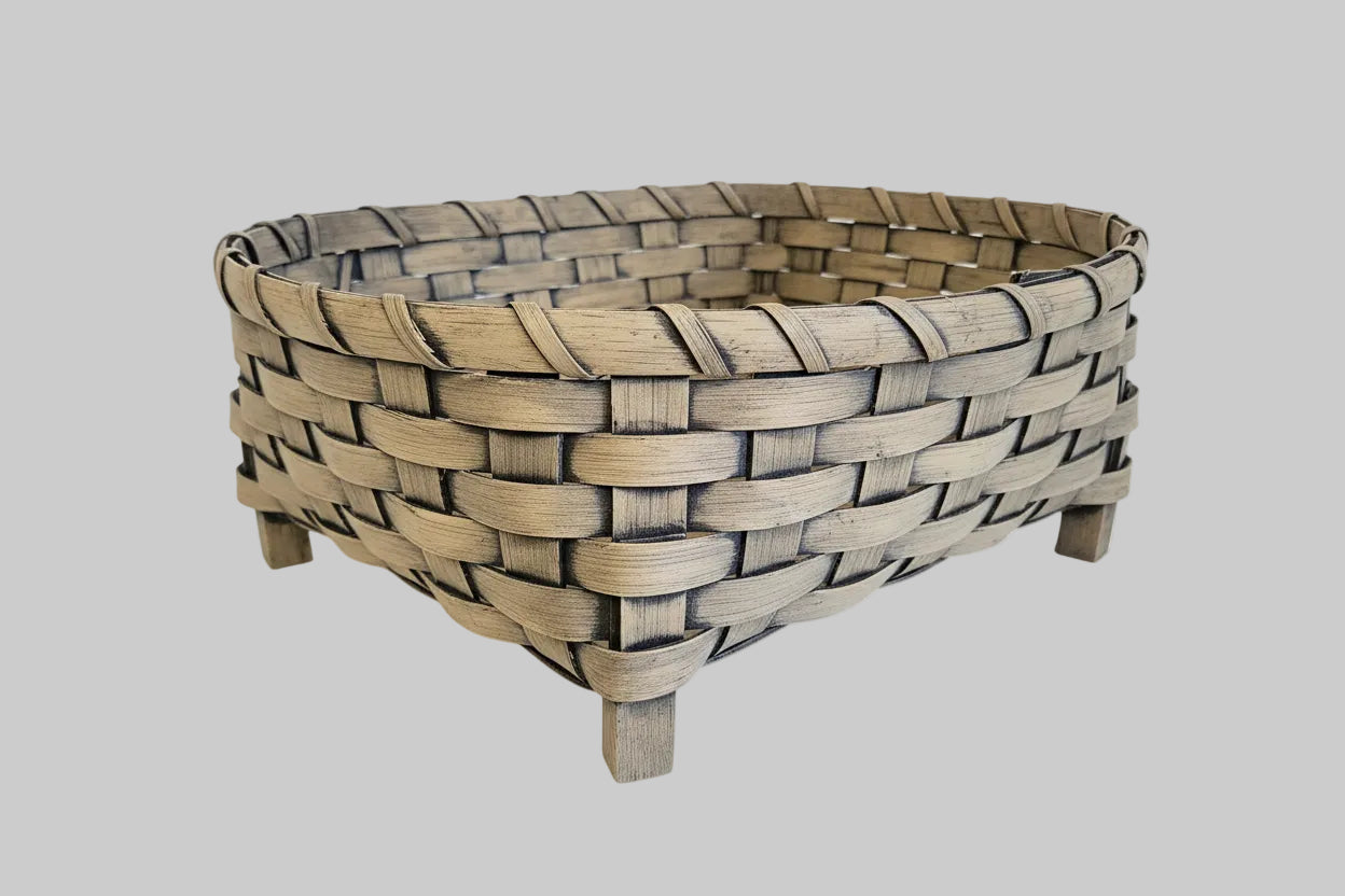 Woven basket with on grey background
