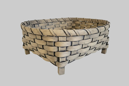 Woven basket with on grey background