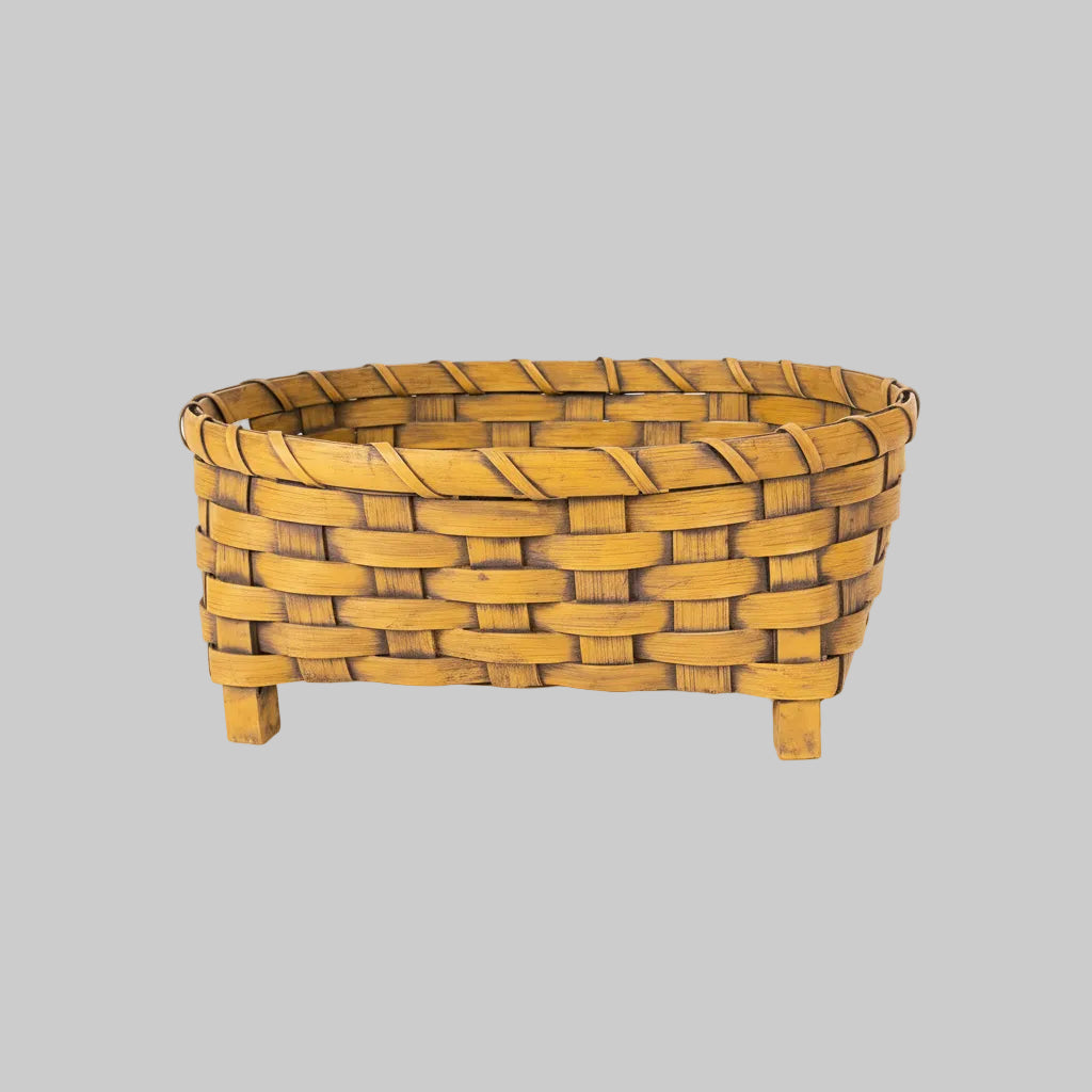 Woven basket on a gray background