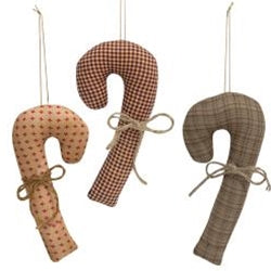 Three plush fabric candy cane ornaments in a tan, cream, and gray checkered patterns with a string hanger at the top.