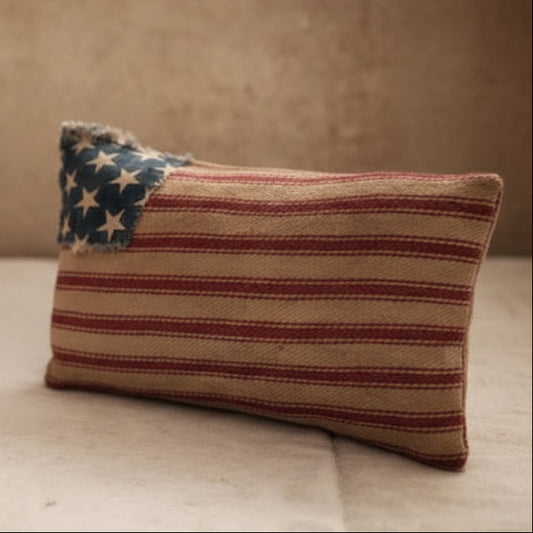 Flag pillow on blurred background