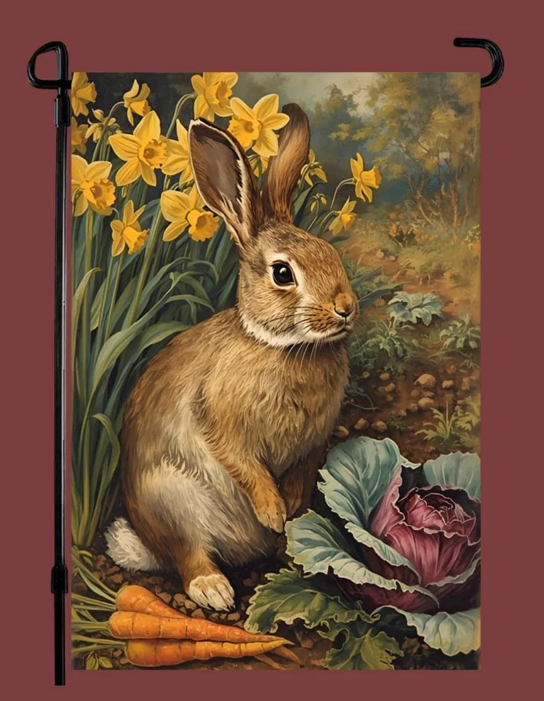 Decorative garden flag with a rabbit, carrots, and flowers on a brown background